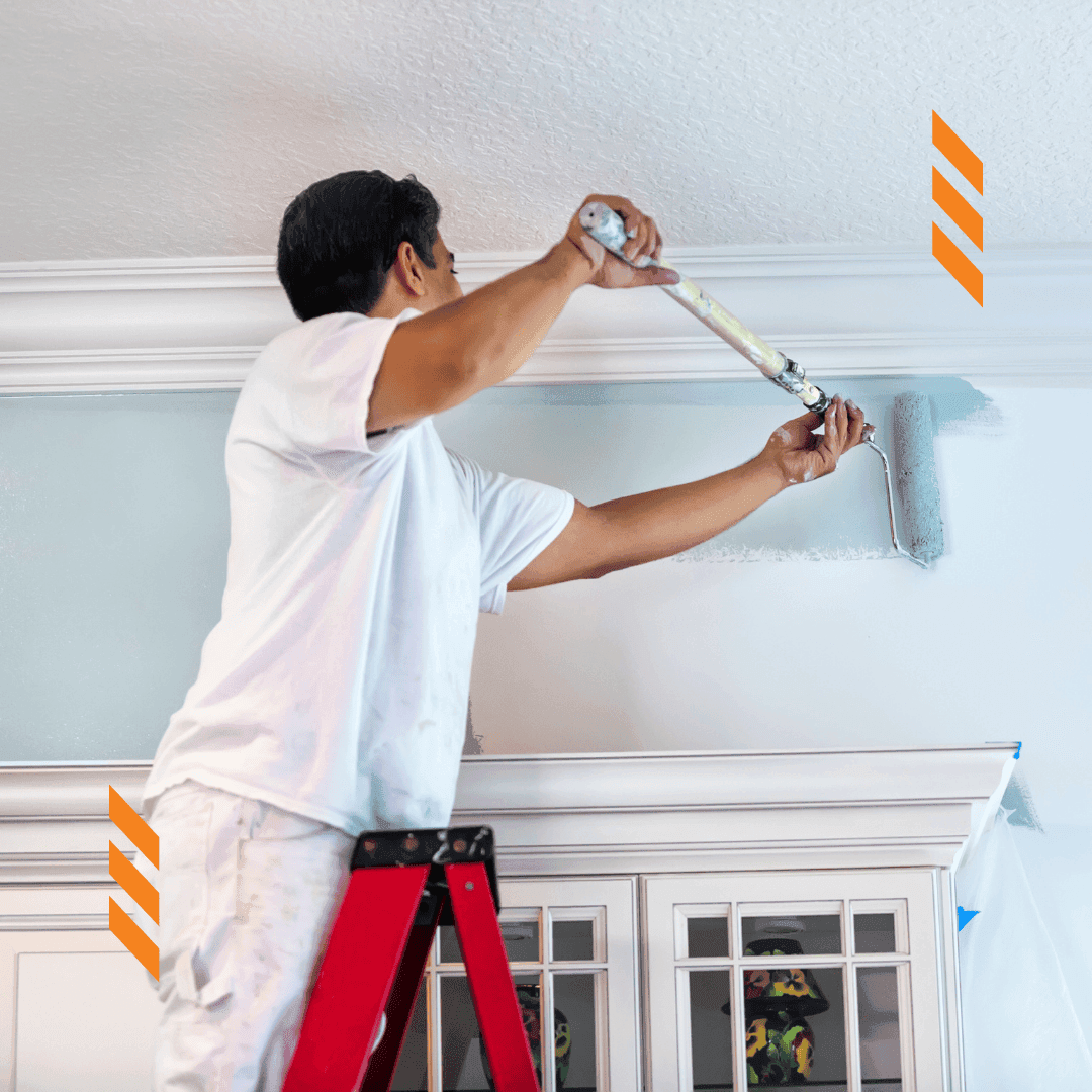 wall-painter-working-on-a-ladder